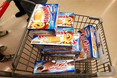 Consumers are looking to chocolate, Oreos, and Twinkies to 'not feel terrible all the time' &mdash; Hershey, Hostess, and Mondelez are cashing in