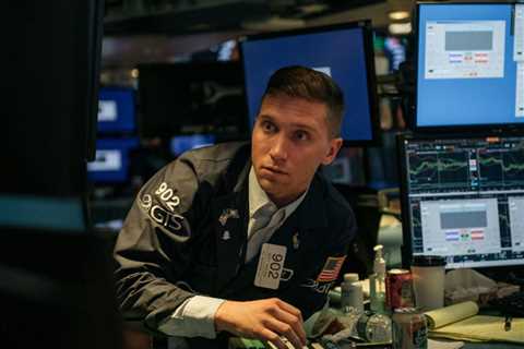Dow futures sink over 300 points, as investors dial back hopes for the Fed to switch course on rate hikes