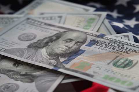 Expect 'one last hurrah' for the dollar before a 2023 recession chips away at its dominance, Wells Fargo says
