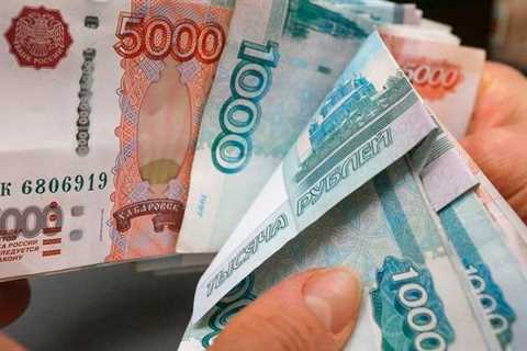 The ruble hits 7-month low versus the dollar as sanctions and trade restrictions weigh on Russia's currency