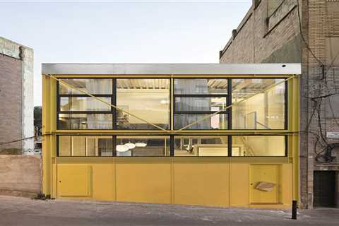 A Bright Yellow Steel Home in Barcelona Breaks With Its Brick Neighbors