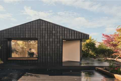 This Garden Studio Wrapped in Charred Timber Shingles Acts Like a Giant Bug Hotel