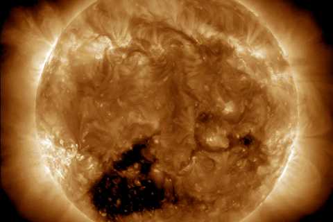 A 'hole' 30 times Earth's size has spread across the sun, blasting solar winds that'll hit our planet by end of this week