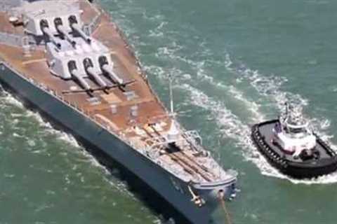 Battleship USS Iowa (BB-61) passing under Golden Gate bridge for her final voyage to LA. 05 26 2012
