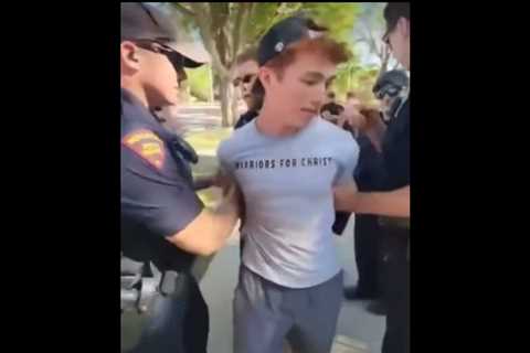 Outrageous! Wisconsin Man Arrested by Dirty Cops While Reading the Bible on Public Property – Was Protesting Drag Event Aimed at Children (VIDEO)