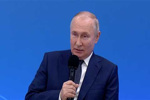 Putin taught a lesson for Russia's new school curriculum, which includes instructions on how to handle a Kalashnikov