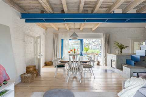 A Blue Stair Steps Up a Filmmaker’s Renovated Brick Home in Slovakia