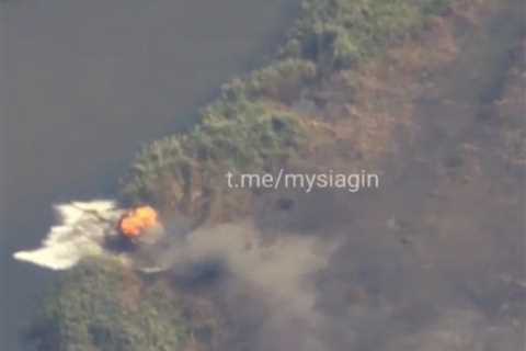 Video appears to show a Russian tank hitting a mine and running out of control before sinking into water