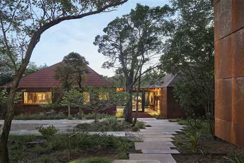 Cor-Ten Steel Cloaks a Set of Four Structures That Form a Texas Home