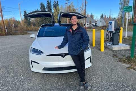 A Tesla owner built a bed and make-shift kitchen for his Model X and lived in his electric car for a year, traveling to 49 states