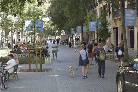 The key to solving loneliness and pollution might be giving up cars and hanging out in the street. It's working in Barcelona.