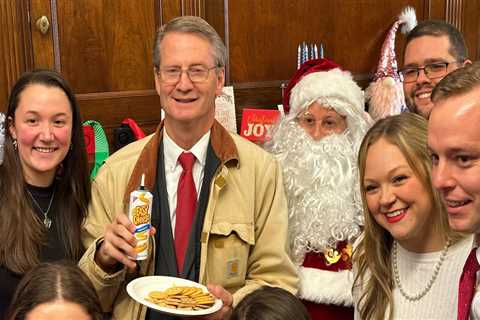 I showed up to a GOP congressman's 16-minute Christmas party. Here's what it was like to watch Democrats and Republicans rub shoulders in his cramped Capitol Hill office.