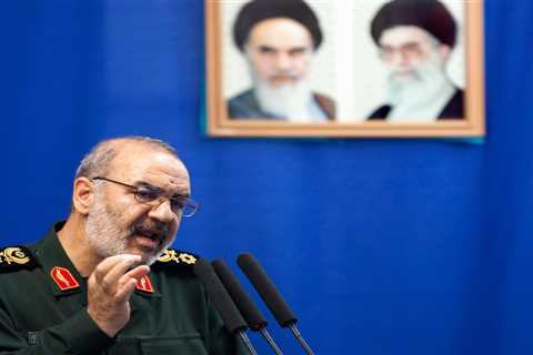 Iran warns it will react decisively if attacked and won't 'leave any threat unanswered' as US plans response to American troops deaths