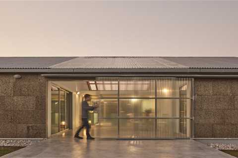 A Greenhouse Warms Up This Cork-Covered Prefab in the Spanish Countryside