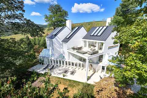 High in the Blue Ridge Mountains, a Snow-White ’80s Home Seeks $2.5M