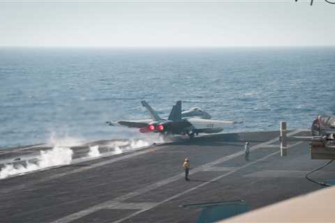 A US Navy carrier strike group locked in a Red Sea battle has fired over 500 munitions fighting the Houthis