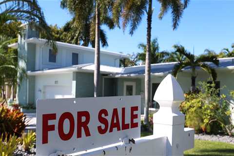 High mortgage rates didn't put a lid on home prices, but soaring insurance costs might, real estate experts say