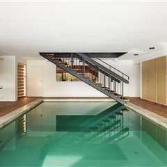 Of Course the Kitchen Matches the Indoor Pool at This Swedish Villa