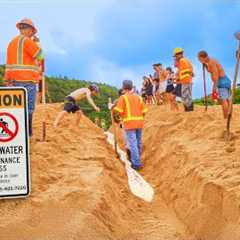 CITY WORKERS CONNECT RIVER TO OCEAN