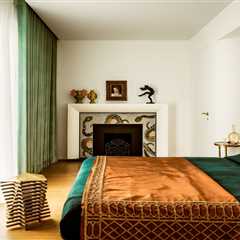 How They Pulled It Off: A Glittering Snake Mosaic Fireplace in a Whimsical Parisian Apartment