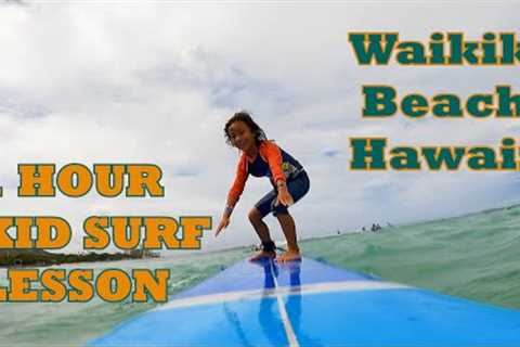 Kid Surfing Lesson with Kahu Surf School Hawaii Waikiki Beach