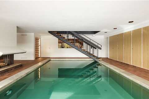 Of Course the Kitchen Matches the Indoor Pool at This Swedish Villa