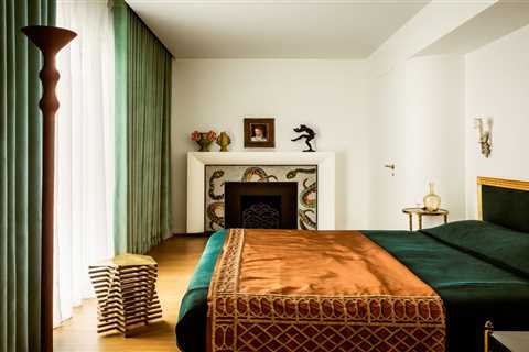 How They Pulled It Off: A Glittering Snake Mosaic Fireplace in a Whimsical Parisian Apartment