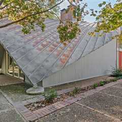 The Roof of This $775K Memphis Midcentury Curves All the Way to the Ground