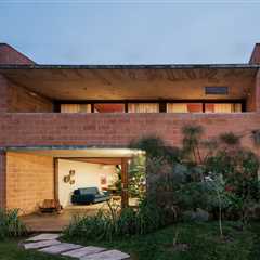 There’s a Tropical Garden at the Heart of This Coastal Brick House in Brazil
