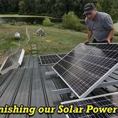 Installing the rest of our solar panels.  Finishing up the installation of our solar power system.