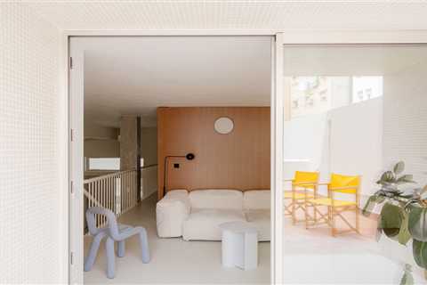 The Staircase in This Small Spanish Apartment Hides a Secret Toilet