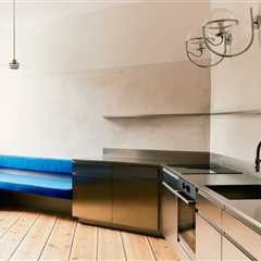 A Curvy Blue Banquette Solves a Tiny Berlin Apartment’s Puzzling Shape