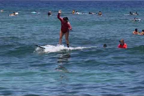 Surfing at Kahalu’u Bay, Big Island