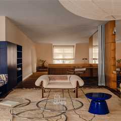 Seating, Shelving, and Spatial Definition—a Blue Box Does It All at This Refreshed Berlin Flat