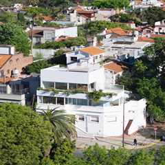 Budget Breakdown: A Buenos Aires Couple Build an Airy Live/Work Home Atop Mom’s Office for $153K