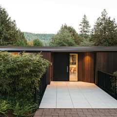 Tall Trees Surround This $3.6M Mountainside Midcentury Near Vancouver