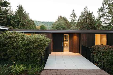 Tall Trees Surround This $3.6M Mountainside Midcentury Near Vancouver