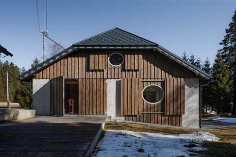 A Fiber-Cement Structure Forms the Interiors of This 19th-Century Czech Cottage