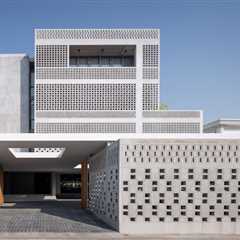 You Couldn’t Begin to Count the Perforations in the Facade of This Bangkok Home