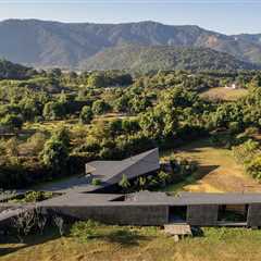 Pools Line the Entrance to This Monolithic Home in Valle de Bravo