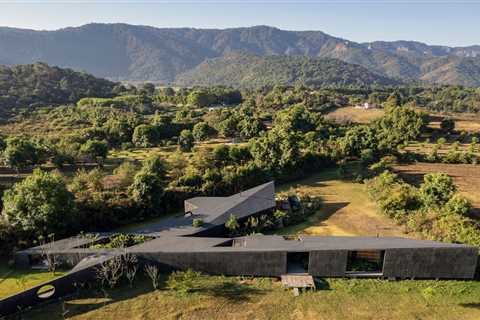 Pools Line the Entrance to This Monolithic Home in Valle de Bravo