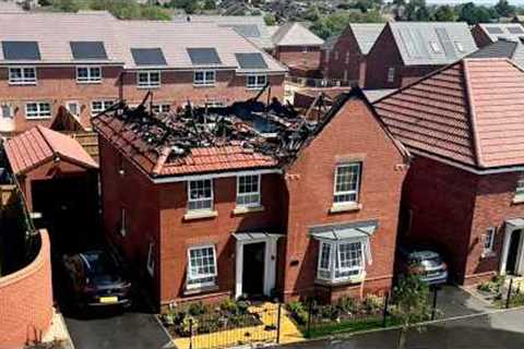 Moment solar panels on £600k house go up in flames with family inside | SWNS