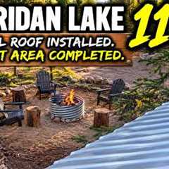 Sheridan lake 11.  Metal roof installed.  Fire pit area leveled. 