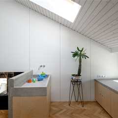In Slovenia, Two 1950s Terrace Homes Trade Tiny Rooms for Light-Filled Vertical Layouts
