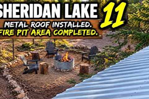 Sheridan lake 11.  Metal roof installed.  Fire pit area leveled. 
