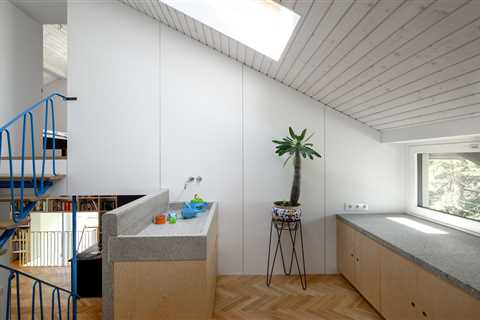 In Slovenia, Two 1950s Terrace Homes Trade Tiny Rooms for Light-Filled Vertical Layouts