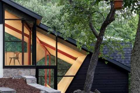A Massive New Roof Turns a ’70s Chalet in Canada Into a Forest Palace