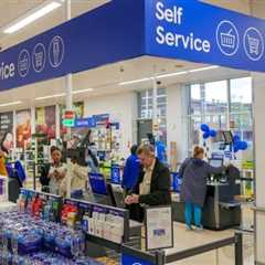 Tesco raises profit forecast and lifts share buyback to £950m