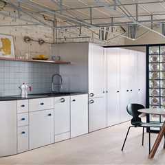 The Loft in This Madrid Flat Hangs From the Ceiling With a Metal Truss