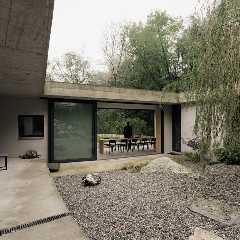 Near Lake Como, This €690K Concrete House Makes the Most of Its Narrow Site